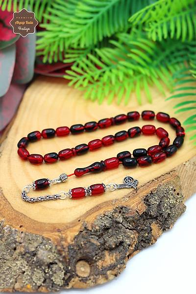 Hareli K�rm�z� Siyah Kaps�l Kesim G�m�� P�sk�ll� Ate� Kehribar Tesbih 201024420