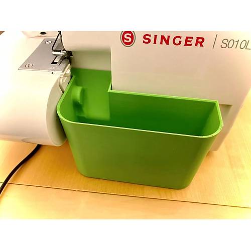 Singer marka overlok makinası artık kumaş haznesi