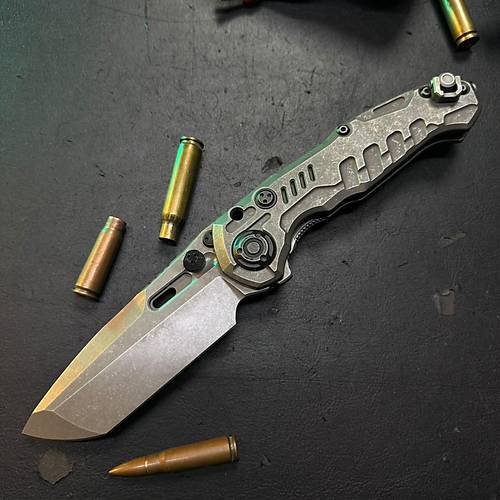 District 9 Catastrophe M390 Titanium � S�n�rlar�n D���nda Bir Tasar�m