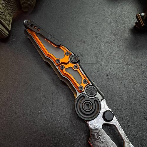 NOC Knives MA01 Damascus � Damascus ve Turuncunun S�ra D��� Birle�imi
