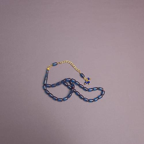 S�kma Kehribar Kaps�l Kesim Alt�n Renk P�sk�ll� 7x11mm Tesbih