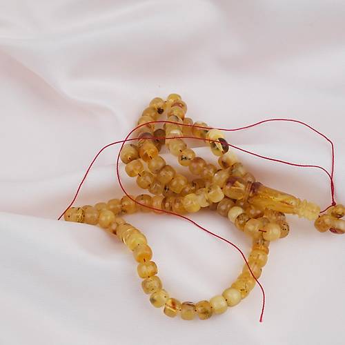 Damla Kehribar 99luk Tekerlek Kesim 6.5x5mm Namez Tesbihi