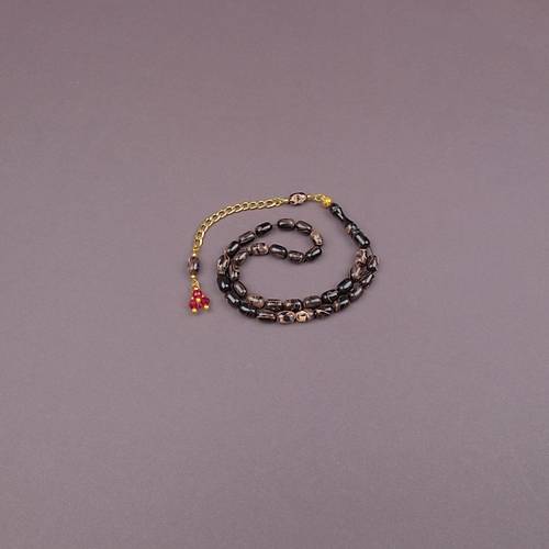 S�kma Kehribar Kaps�l Kesim Alt�n Renk P�sk�ll� 7x11mm Tesbih Kahverengi