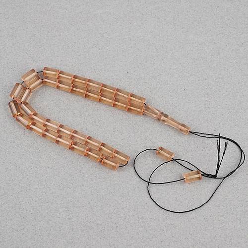 Ate� Kehribar Kesme Kesim 7x11mm Tesbih -G�l Kurusu �effaf