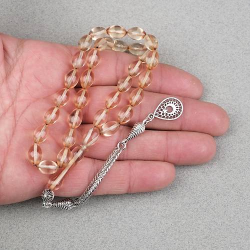 Ate� Kehribar Alpaka P�sk�ll� Beyzi Kesim 7x11mm Tesbih- A��k Sar�