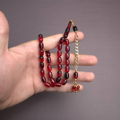 S�kma Kehribar Kaps�l Kesim Alt�n Renk P�sk�ll� 7x11mm Tesbih