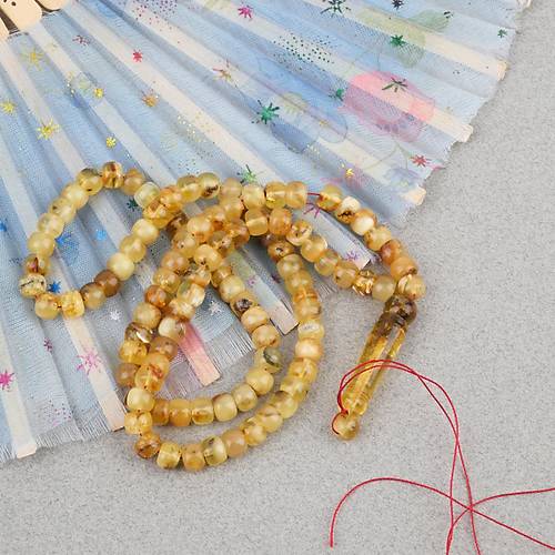 Damla Kehribar 99luk Tekerlek Kesim 6.5x5.5mm Namez Tesbihi