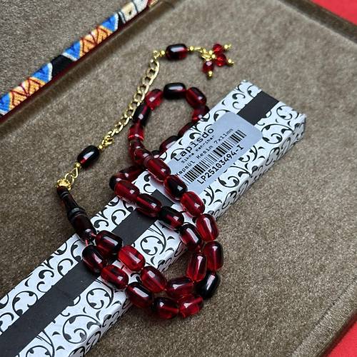 S�kma Kehribar Kaps�l Kesim Alt�n Renk P�sk�ll� 7x11mm Tesbih