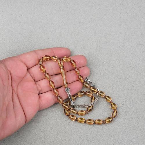 Ate� Kehribar Alpaka P�sk�ll� Beyzi Kesim 7x11mm Tesbih- A��k Sar�