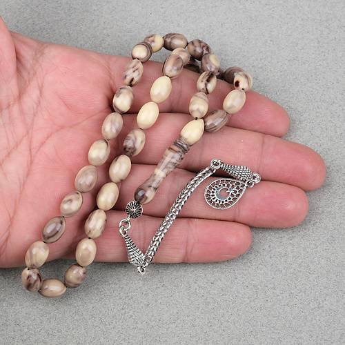 S�kma Kehribar Alpaka P�sk�ll� Beyzi Kesim 7x11mm Tesbih- Kahverengi