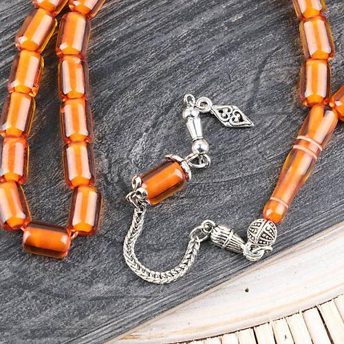 Ate� Kehribar Alpaka P�sk�ll� Kaps�l Kesim 7x10.5mm Tesbih - �effaf Kahverengi