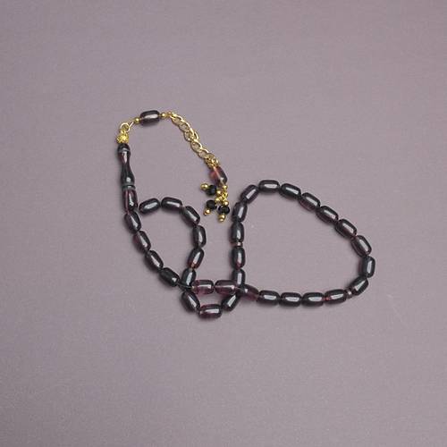 S�kma Kehribar Kaps�l Kesim Alt�n Renk P�sk�ll� 7x11mm Tesbih