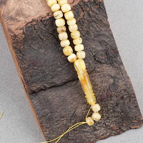 Damla Kehribar 99luk Tekerlek Kesim 7x5.5mm Namez Tesbihi