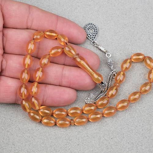 S�kma Kehribar Alpaka P�sk�ll� Beyzi Kesim 7x11mm Tesbih- �effaf Koyu Sar�