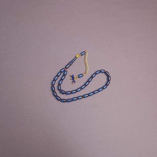 S�kma Kehribar Kaps�l Kesim Alt�n Renk P�sk�ll� 7x11mm Tesbih