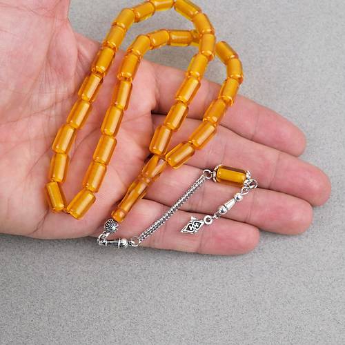Ate� Kehribar Alpaka P�sk�ll� Kaps�l Kesim 7x11mm Tesbih - �effaf Sar�