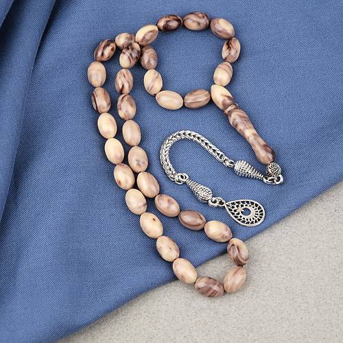 S�kma Kehribar Alpaka P�sk�ll� Beyzi Kesim 7x11mm Tesbih- Kahverengi