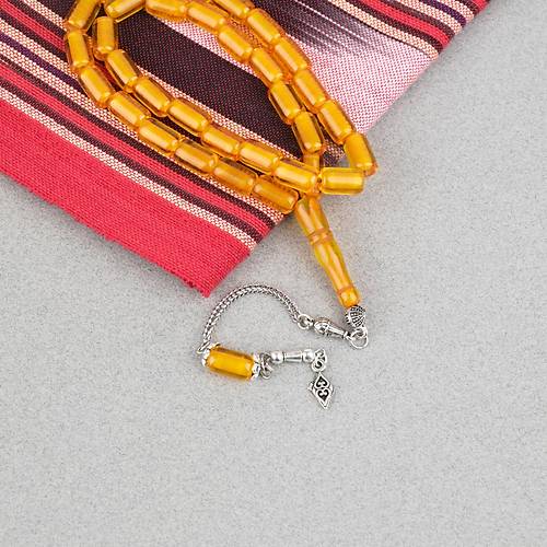 Ate� Kehribar Alpaka P�sk�ll� Kaps�l Kesim 7x11mm Tesbih - �effaf Sar�
