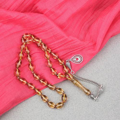 Ate� Kehribar Alpaka P�sk�ll� Beyzi Kesim 7x11mm Tesbih- A��k Sar�