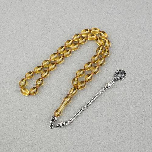 Ate� Kehribar Alpaka P�sk�ll� Beyzi Kesim 7x11mm Tesbih- �effaf Sar�