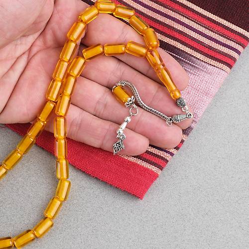 Ate� Kehribar Alpaka P�sk�ll� Kaps�l Kesim 7x11mm Tesbih - �effaf Sar�