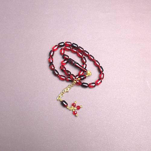 S�kma Kehribar Kaps�l Kesim Alt�n Renk P�sk�ll� 7x11mm Tesbih