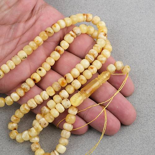 Damla Kehribar 99luk Tekerlek Kesim 7x5.5mm Namez Tesbihi