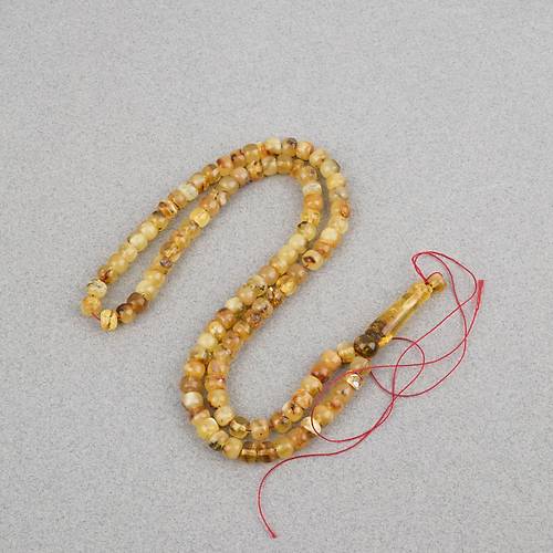 Damla Kehribar 99luk Tekerlek Kesim 6.5x5.5mm Namez Tesbihi