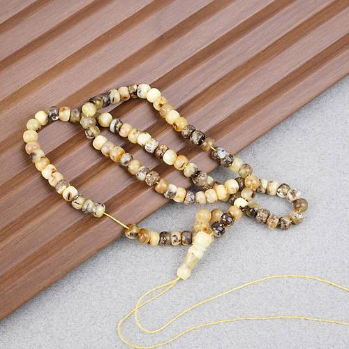 Damla Kehribar 99luk Tekerlek Kesim 5.5x4mm Namez Tesbihi