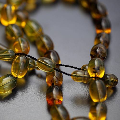 Dominik Mavi Kaya Fosil Amber Badem Kesim 10.8x15mm Tesbih