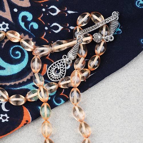 Ate� Kehribar Alpaka P�sk�ll� Beyzi Kesim 7x11mm Tesbih- A��k Sar�