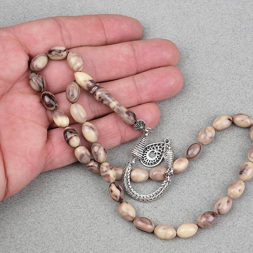 S�kma Kehribar Alpaka P�sk�ll� Beyzi Kesim 7x11mm Tesbih- Kahverengi