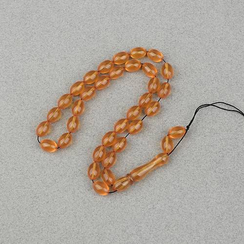 S�kma Kehribar Beyzi Kesim 7x11mm Tesbih- �effaf Koyu Sar�