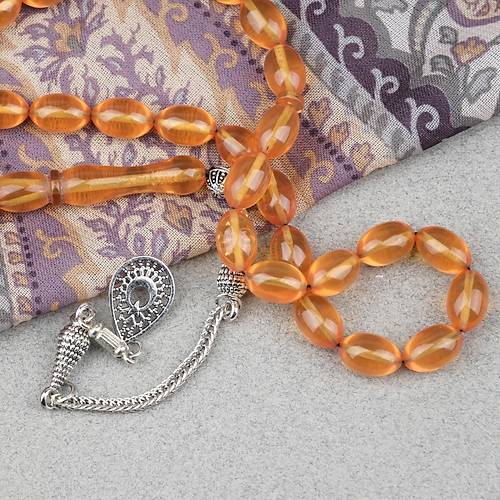 S�kma Kehribar Alpaka P�sk�ll� Beyzi Kesim 7x11mm Tesbih- �effaf Koyu Sar�