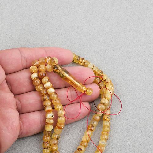 Damla Kehribar 99luk Tekerlek Kesim 6.5x5.5mm Namez Tesbihi