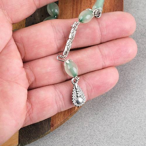 Kedig�z� Alpaka P�sk�ll� Beyzi Kesim 7x11mm Tesbih- Ye�il