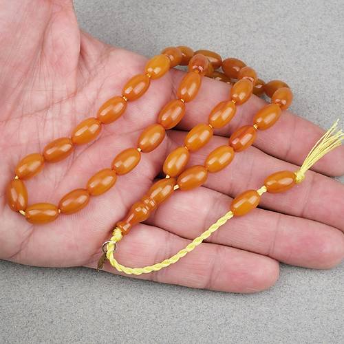 Omari S�kma Kehribar Beyzi Kesim Sistemli 7.5x12mm Tesbih