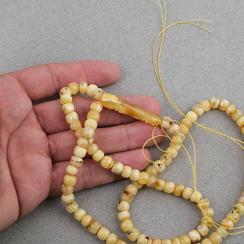 Damla Kehribar 99luk Tekerlek Kesim 7x5.5mm Namez Tesbihi