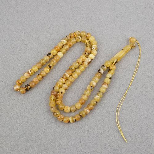 Damla Kehribar 99luk Tekerlek Kesim 7.5x6.5mm Namez Tesbihi