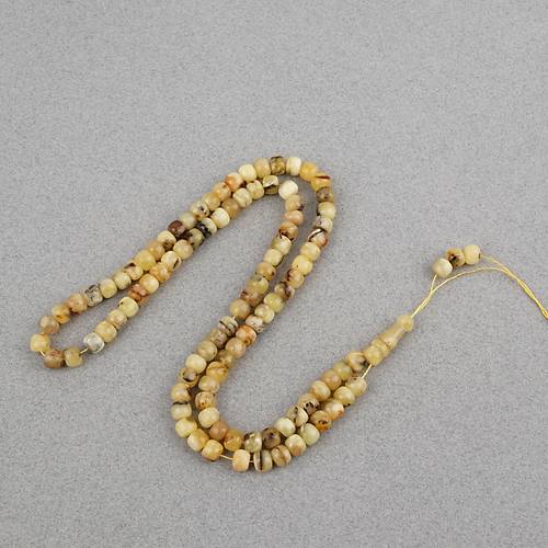 Damla Kehribar 99luk Tekerlek Kesim 7x5mm Namez Tesbihi