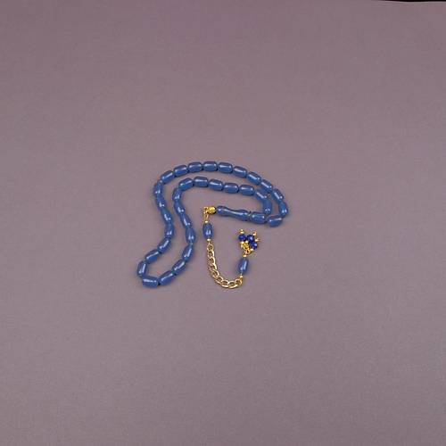S�kma Kehribar Kaps�l Kesim Alt�n Renk P�sk�ll� 7x11mm Tesbih Mavi