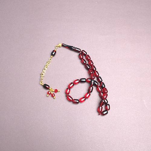 S�kma Kehribar Kaps�l Kesim Alt�n Renk P�sk�ll� 7x11mm Tesbih
