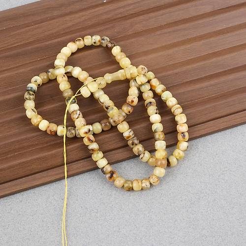 Damla Kehribar 99luk Tekerlek Kesim 7x5mm Namez Tesbihi