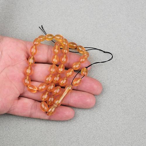S�kma Kehribar Beyzi Kesim 7x11mm Tesbih- �effaf Koyu Sar�