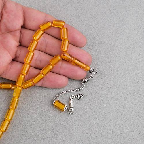 Ate� Kehribar Alpaka P�sk�ll� Kaps�l Kesim 7x11mm Tesbih - �effaf Sar�