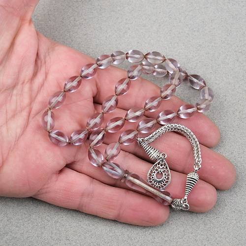 Ate� Kehribar Alpaka P�sk�ll� Beyzi Kesim 7x11mm Tesbih- �effaf Gri