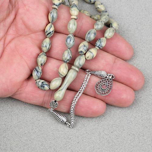 S�kma Kehribar Alpaka P�sk�ll� Beyzi Kesim 7x11mm Tesbih- Krem Ye�il