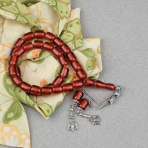 Ate� Kehribar Alpaka P�sk�ll� Kaps�l Kesim 9x10.5mm Tesbih - �effaf Bronz