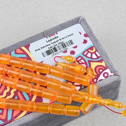 Ate� Kehribar Eski Oyun Zar Obje Patinli Kaps�l Kesim 8.5x12.5mm Tesbih