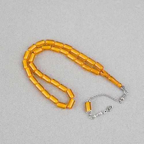 Ate� Kehribar Alpaka P�sk�ll� Kaps�l Kesim 7x11mm Tesbih - �effaf Sar�